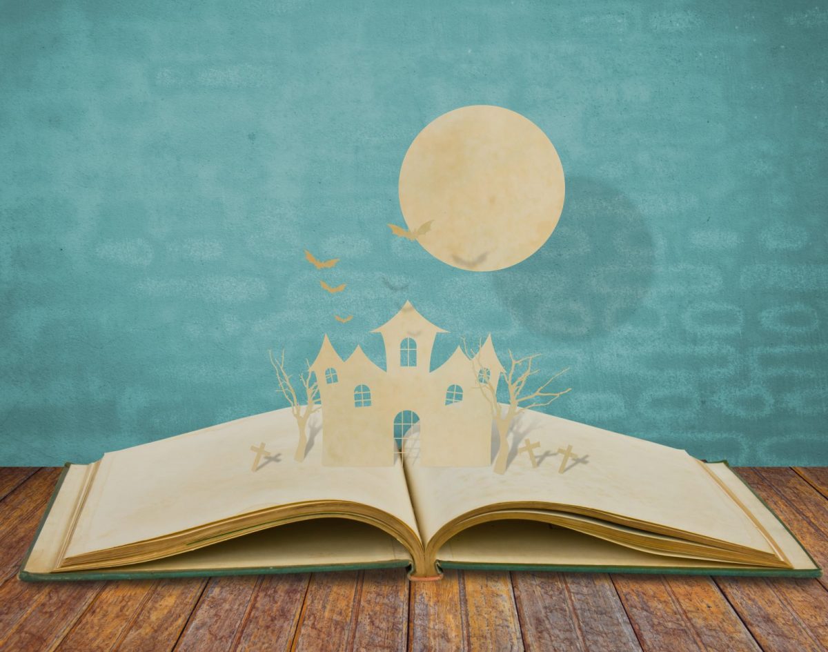 Paper cut of halloween on old book